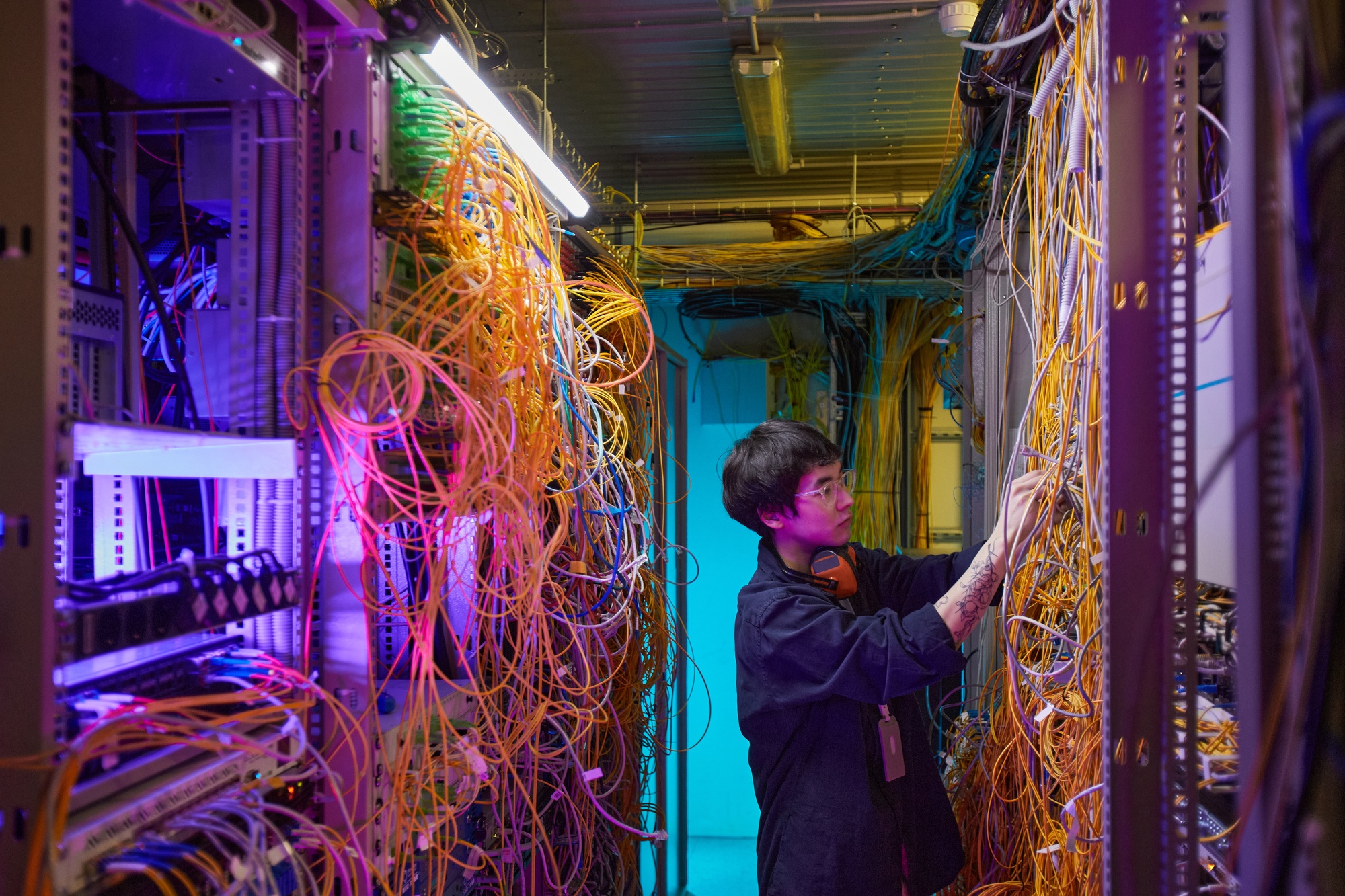 Technician Inspecting Server Hub